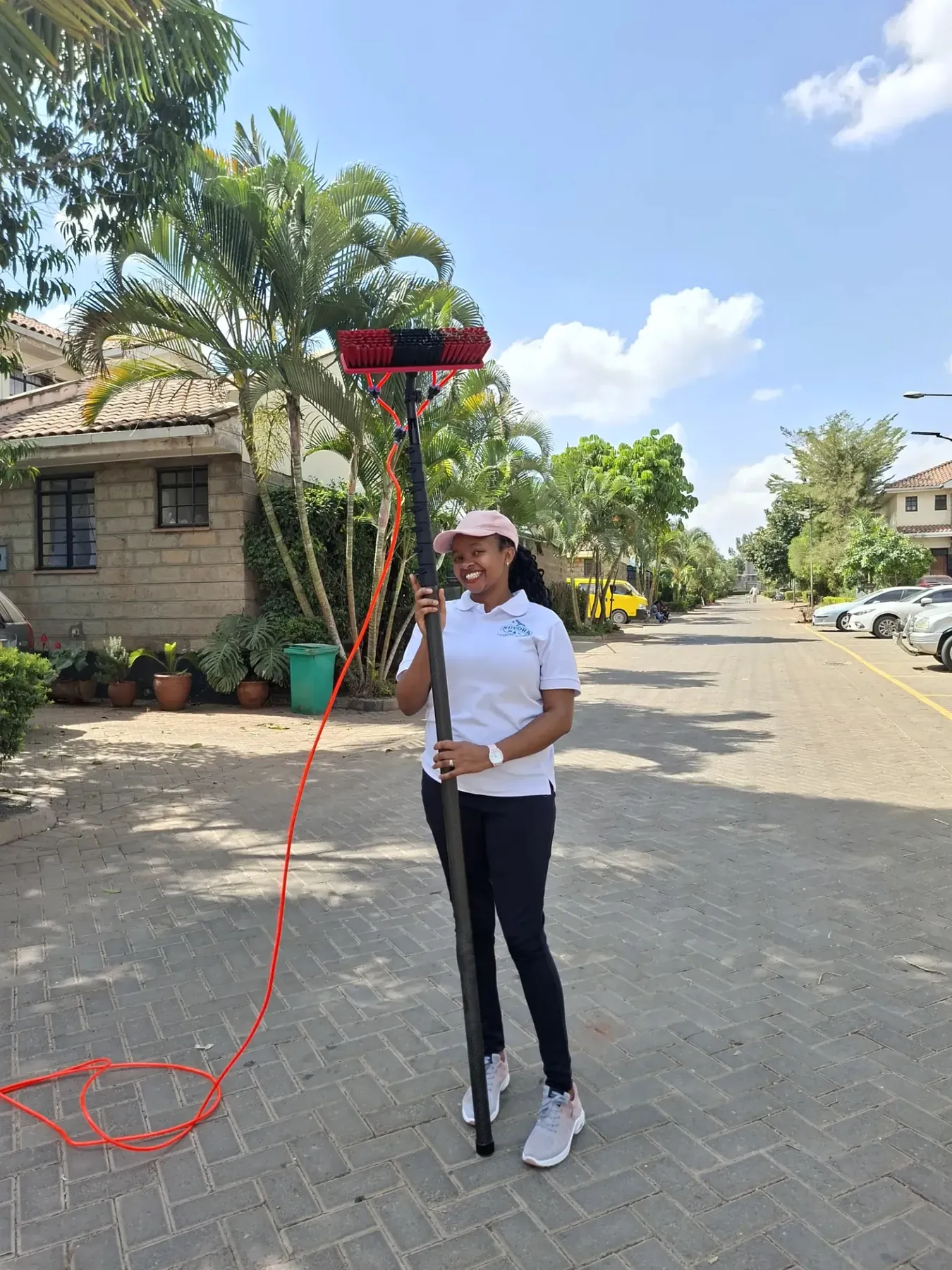 Dirty Nuvora technician cleaning residential glass